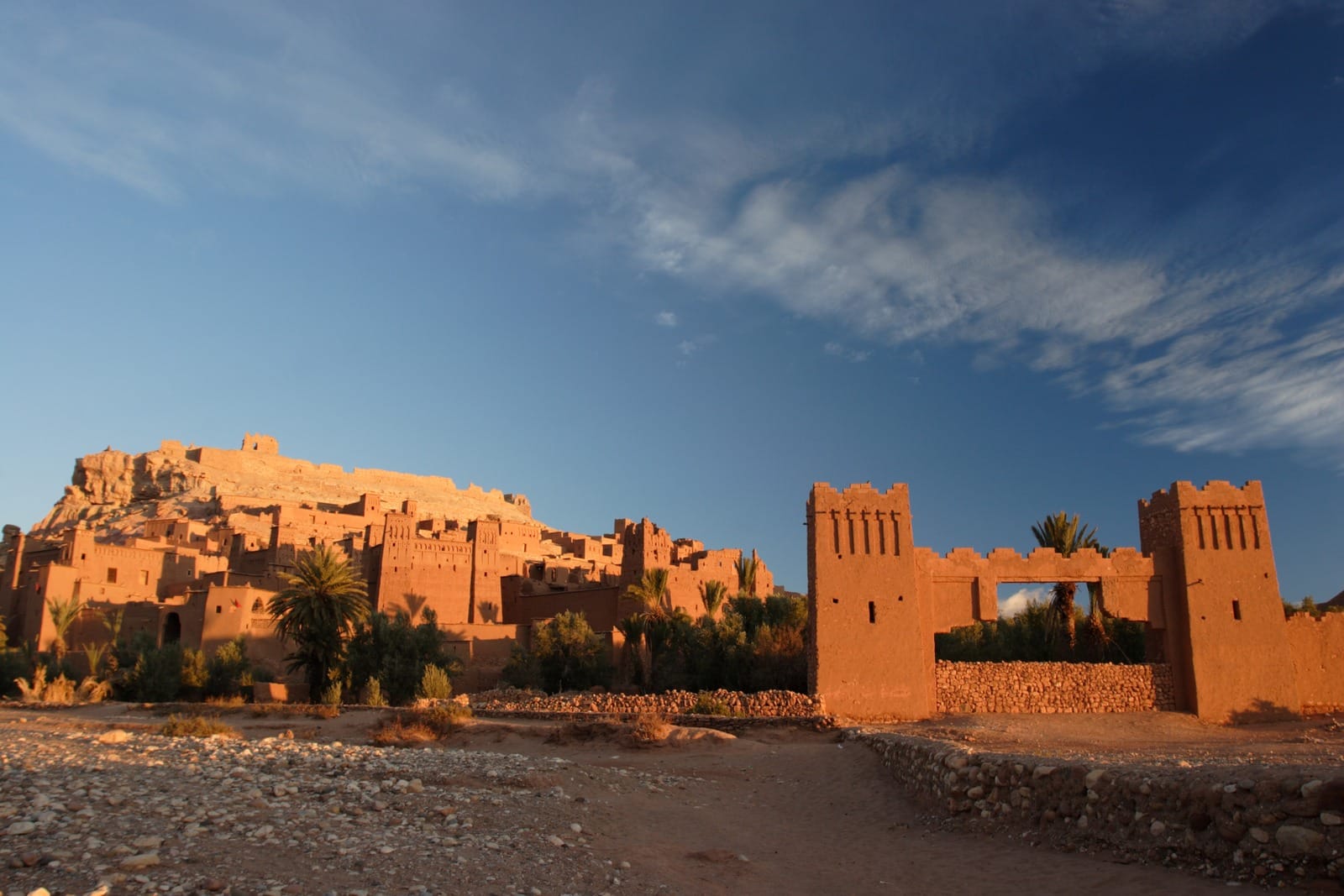 Ait Benhaddou ksar and crenellated gate towers at golden hour