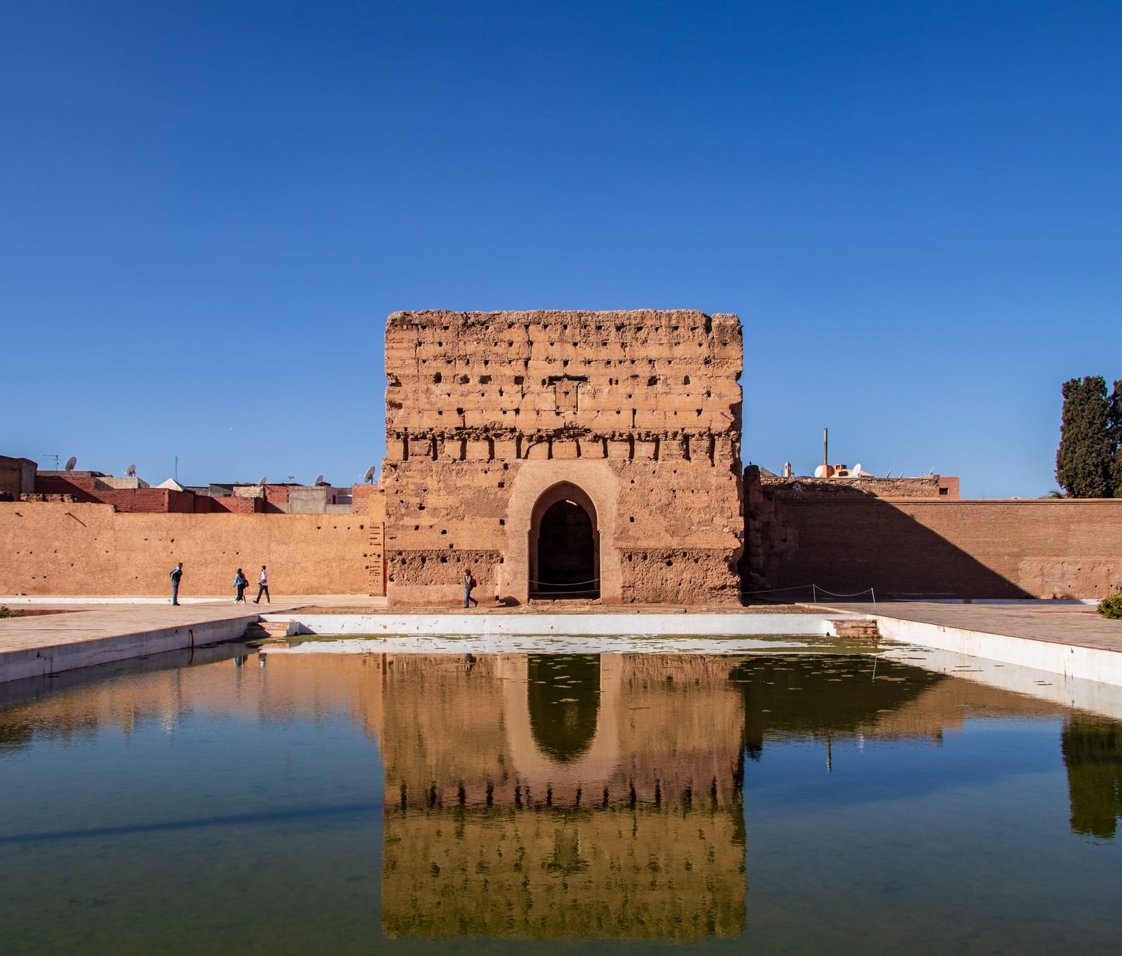 Koubba pavilion mirrored in the sunken reflecting pool, El Badi Palace Marrakech
