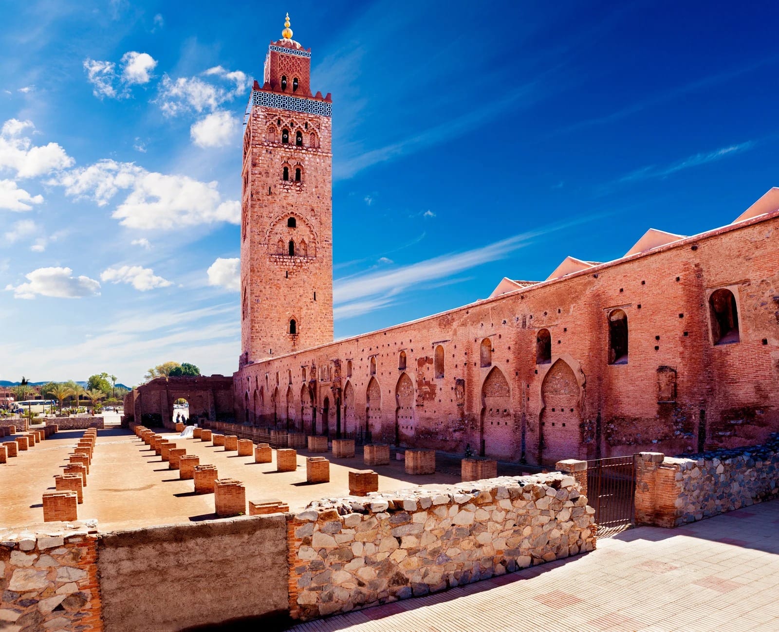 Koutoubia minaret rising above the ruined pillar bases of the first mosque, Marrakech