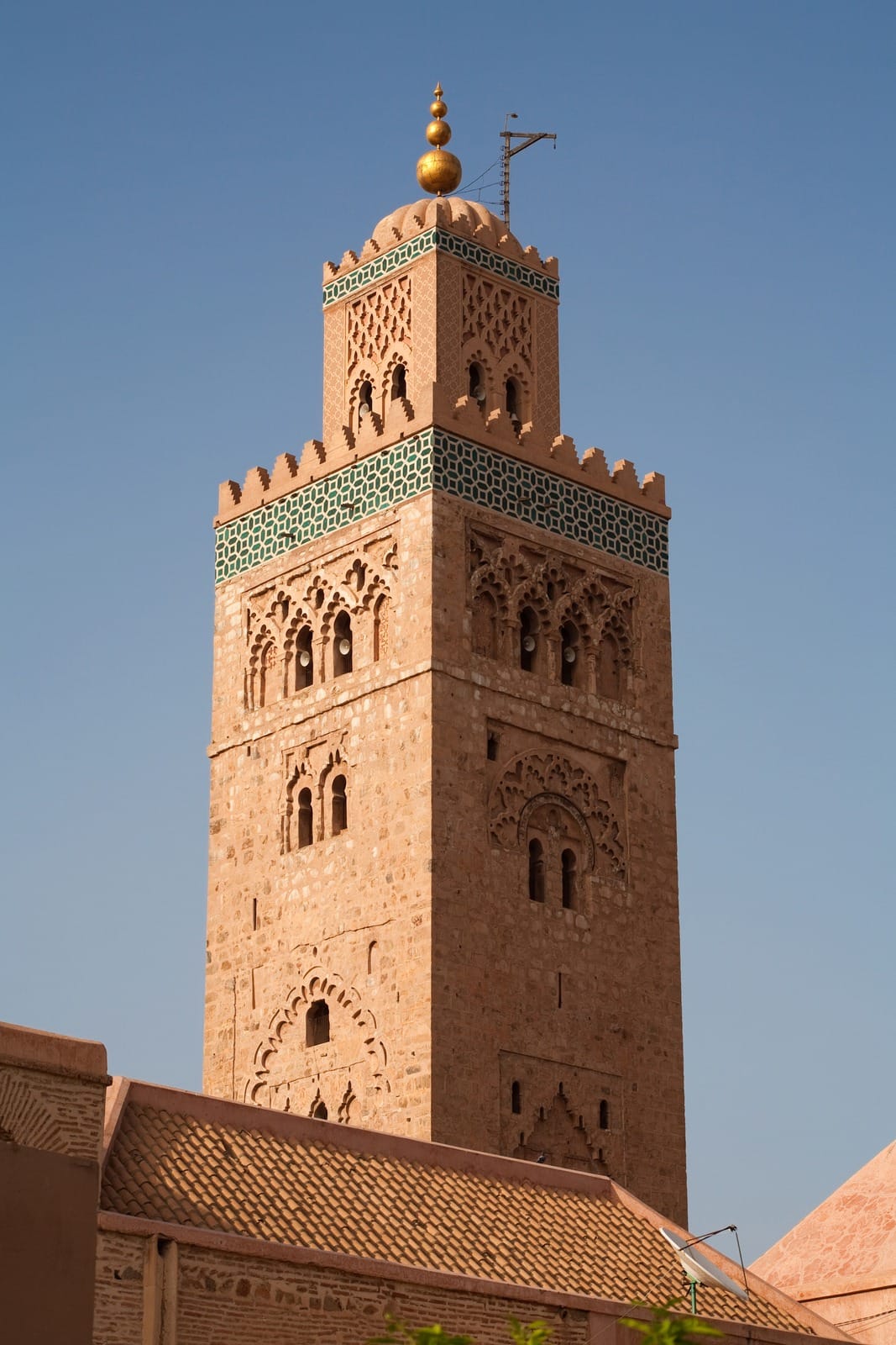 Carved darj-w-ktaf panels and green tilework band on the Koutoubia minaret